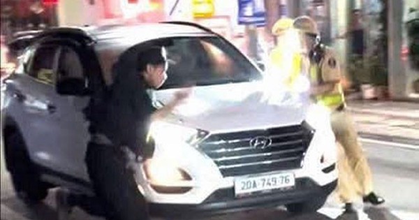 Trốn đo nồng độ cồn, tài xế tăng ga tông thẳng ô tô vào CSGT