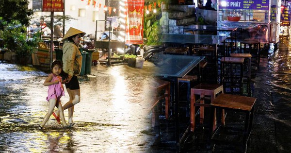 Mưa lớn "đánh úp" Sài Gòn: Người dân bì bõm lội trên đường, quán xá ngập trong nước
