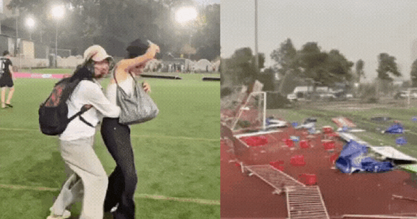 Sân bóng tại Hà Nội tan hoang do mưa dông dữ dội, mỹ nhân bóng đá bị gió thổi ngã dúi dụi