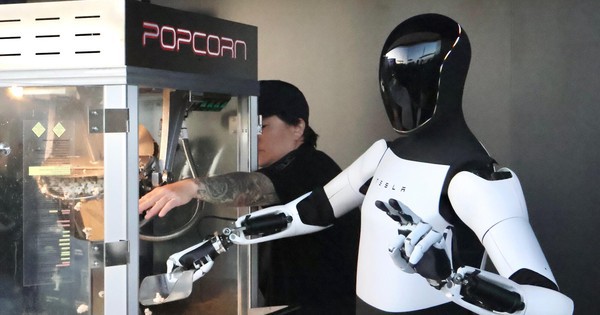 Tesla ra mắt trạm sạc với phong cách độc lạ, mỗi tội robot Optimus xúc bỏng ngô mà vãi như trẻ con học dùng thìa