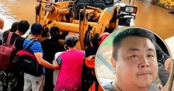 'Người hùng' dùng gầu xúc đất của máy ủi cứu hơn 100 nạn nhân lũ lụt