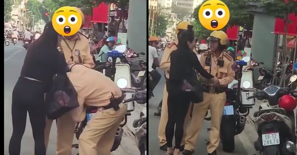 Giằng co với 2 CSGT giữa phố, giật tờ giấy xanh: Cô gái giải thích