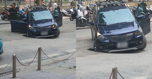 Ô tô sụt hố trước cổng Bệnh viện K Hà Nội